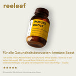 Reeleef Immune Boost Glas mit Kapseln vor dem Glass. Neem Pulver in Neem Kapseln zur Unterstützung des Immune Systems und der Abwehrkräfte