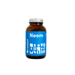 Flasche mit Neemkapseln im Glas